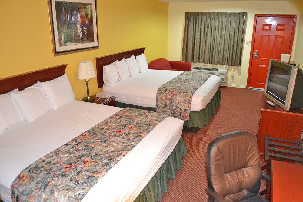 Executive Inn & Suites Magnolia Exteriör bild