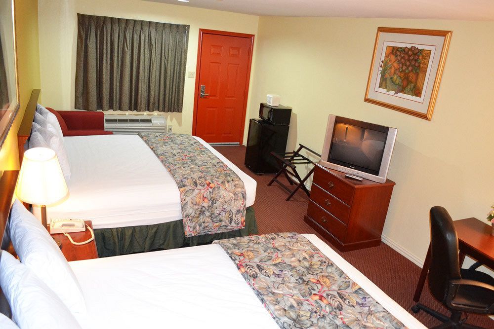 Executive Inn & Suites Magnolia Exteriör bild
