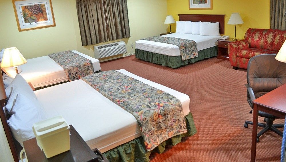 Executive Inn & Suites Magnolia Exteriör bild